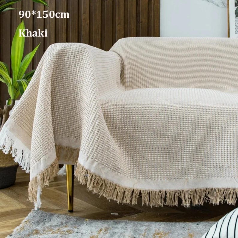 Gestrickte Sofadecke aus Baumwolle und Polyester mit Quastenfransen und Jacquard-Muster