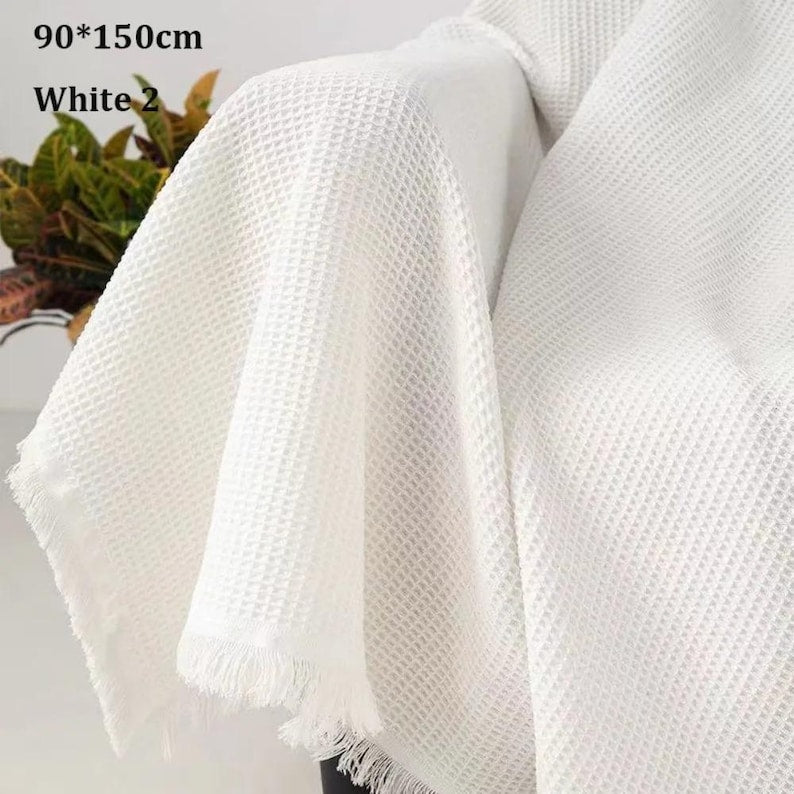 Gestrickte Sofadecke aus Baumwolle und Polyester mit Quastenfransen und Jacquard-Muster